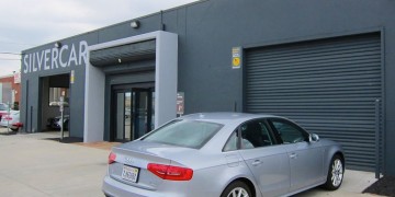 a car parked in front of a building