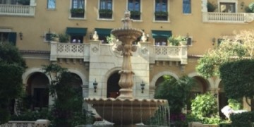 a fountain in front of a building