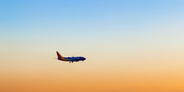 a plane flying in the sky