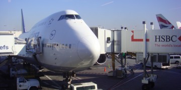 a large white airplane at an airport