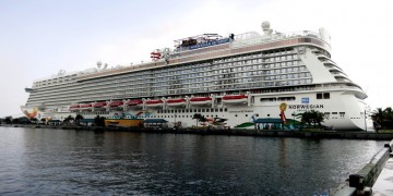 a large cruise ship on the water