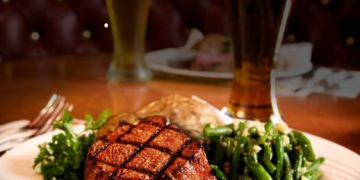 a plate of food with beer