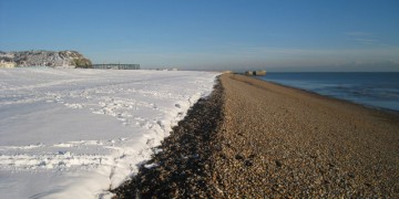 a snow on the beach