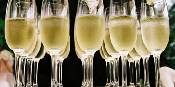 a group of champagne glasses