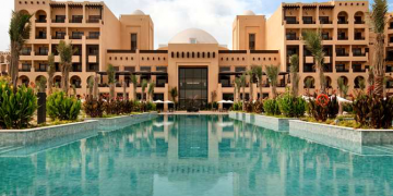 a pool in front of a building