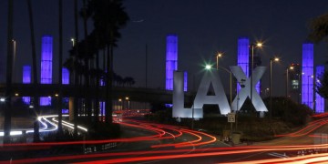 a large sign with lights on it