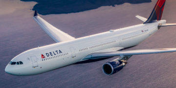 a large white airplane on the ground