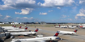 Delta Air Lines airplanes at gates Concourse B Atlanta airport