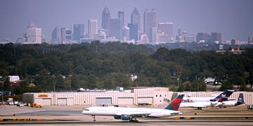 Atlanta airport with city skyline