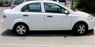 Avis white rental car