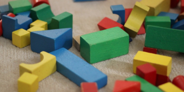 a group of colorful wooden blocks