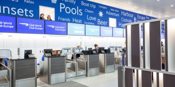 people at a check-in counter