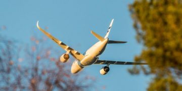 a plane flying in the sky