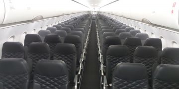 rows of seats in an airplane