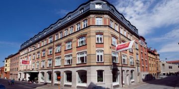 a building with a flag on the side