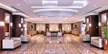 a large room with a marble floor