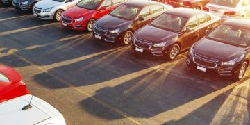 a group of cars parked in a parking lot