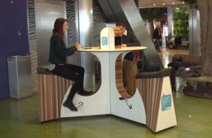 a woman sitting at a desk