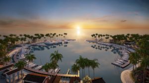 a body of water with boats and palm trees