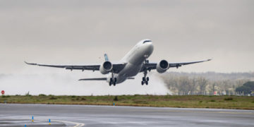 an airplane taking off from a runway