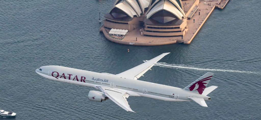 a plane flying over water