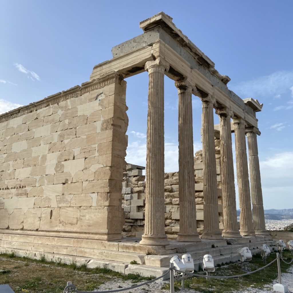 a stone building with pillars