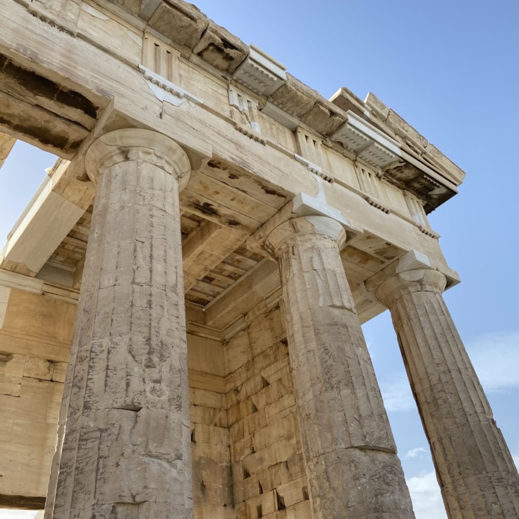 a stone structure with pillars