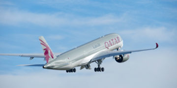 a plane flying in the sky