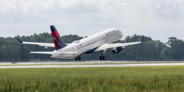 a plane taking off from a runway