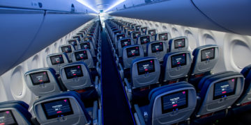 rows of seats in an airplane