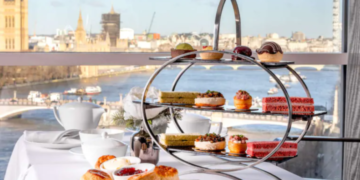 a tray of pastries and pastries on a table