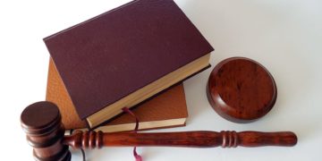 a gavel and a book