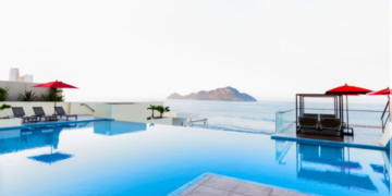 a pool with a view of the ocean