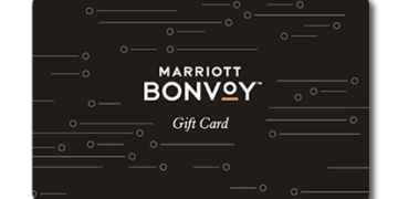 a black gift card with white text and dots