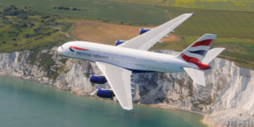 an airplane flying over water