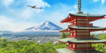 a red pagoda with a plane flying in the sky