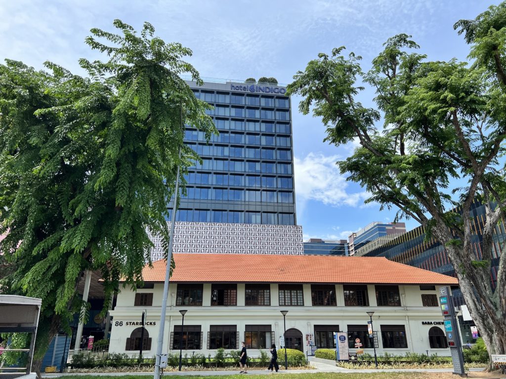 a building with trees in front of it