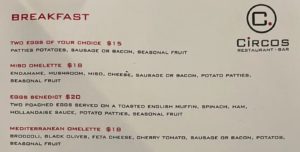 a menu with red text