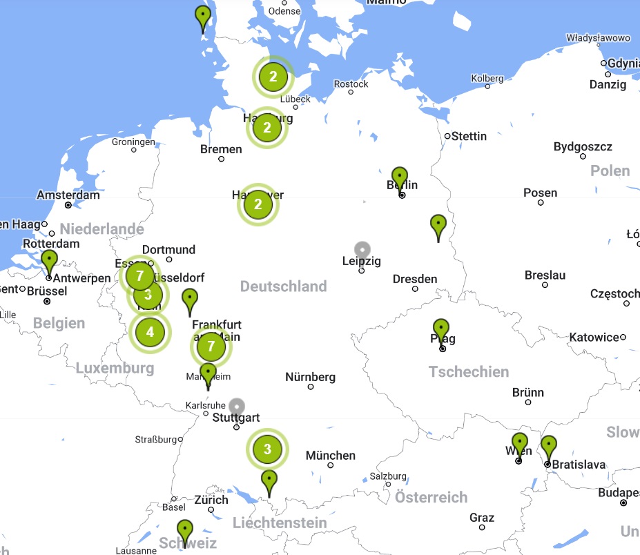 a map of germany with green dots